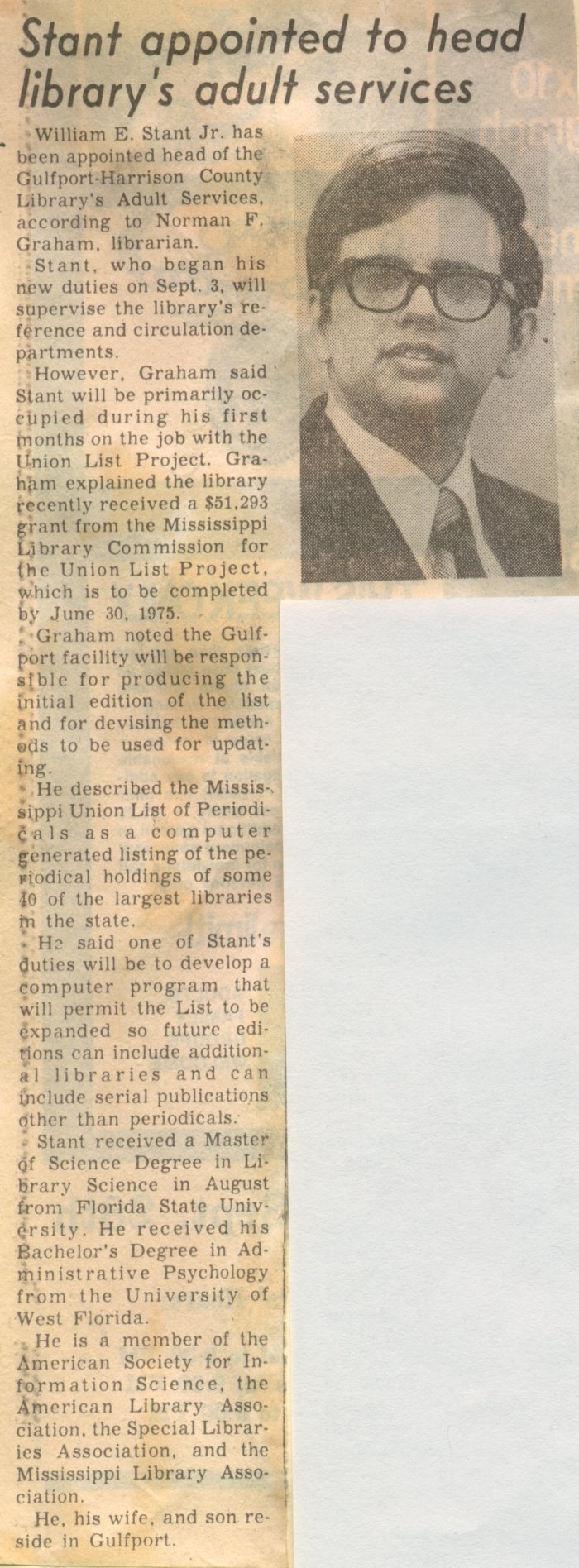 A newspaper clipping titled “Stant appointed to head library’s adult services.” The article announces that William E. Stant Jr. has been appointed head of the Gulfport-Harrison County Library’s Adult Services. It explains his responsibilities, including supervising reference and circulation departments and working on the Mississippi Union List of Periodicals project. The article also mentions his educational background, professional affiliations, and residence in Gulfport.