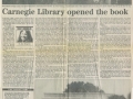 A newspaper page titled “Carnegie Library opened the book,” featuring multiple columns of text, a small portrait image, and a photograph at the bottom showing a building.